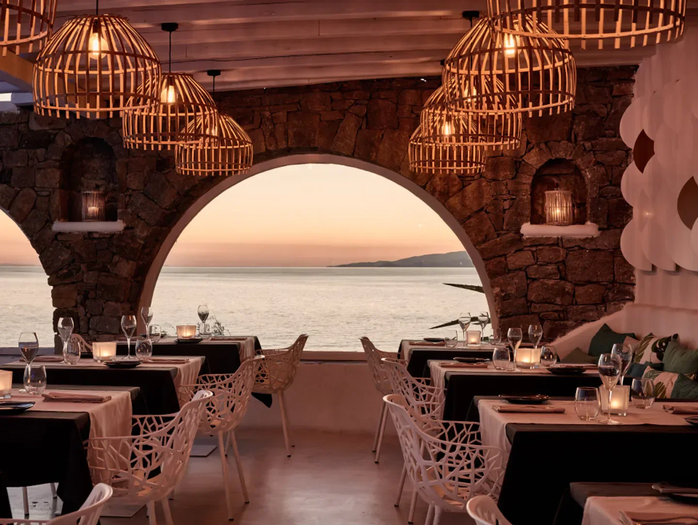 Interior of Narcissus restaurant in Mykonos, featuring sea views and elegant decor